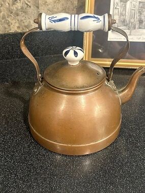 Vintage Copper Tea Kettle with Blue and White porcelain details.